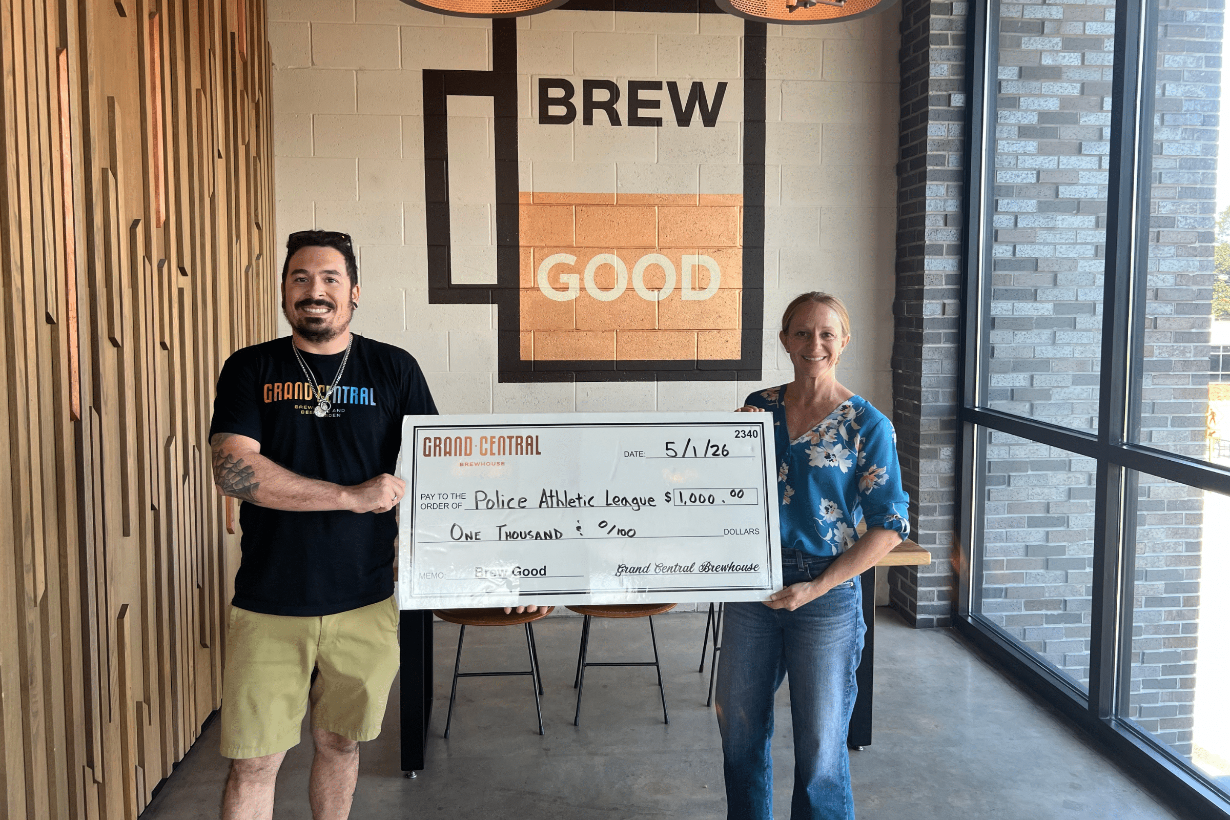 ST Pete Police Athletic League Brew Good Partner Check Presentation