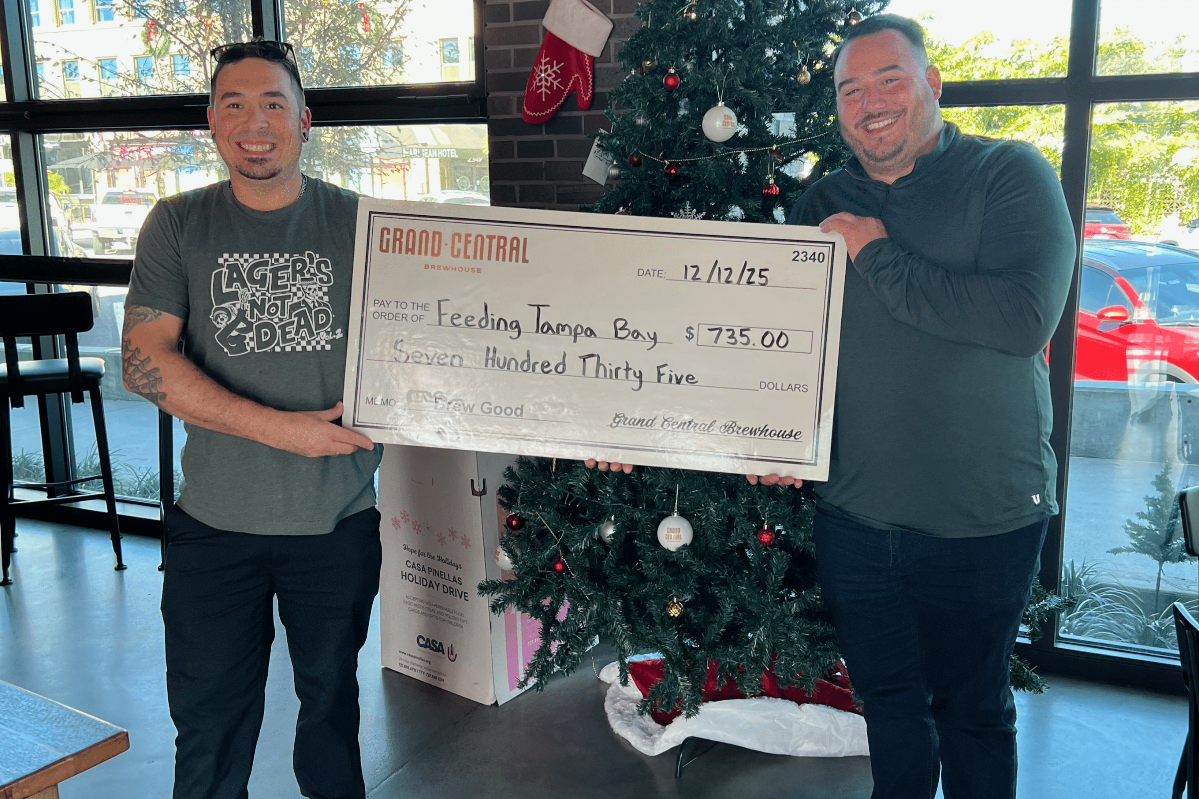 Feeding Tampa Bay Brew Good Partner Check Presentation